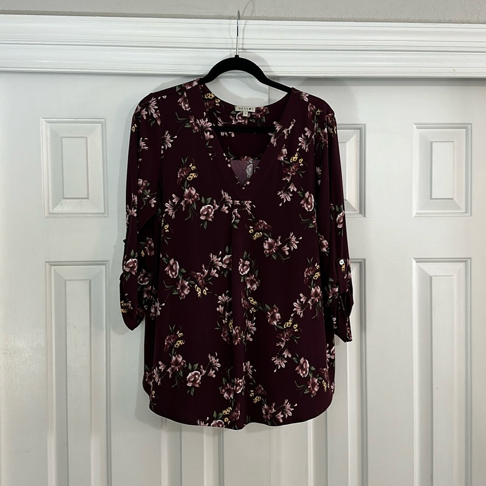 3/4 sleeve length shirt. Perfect for work. Maroon and floral pattern